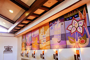 he sanctuary of Congregation Sha'are Zedeck in San Juan, Puerto Rico, features tapestries of the 12 Tribes of Israel. Photo by Larry Luxner. With permission.