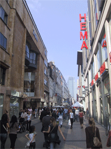 RUE NEUVE, BRUSSELS, BELGIUM: Rue Neuve (French) or Nieuwstraat (in Dutch) is a pedestrian street in Brussels' city center. It is the most popular shopping area in Belgium by number of shoppers. It runs between Place de la Monnaie in the south and Place Charles Rogier in the north. The street used to be called rue Notre-Dame, after the Notre-Dame du Finist�re church, which is now in the middle of the retail district. Rue Neuve has the highest rents of any street in Belgium, at 1,625 �/square metre/year.